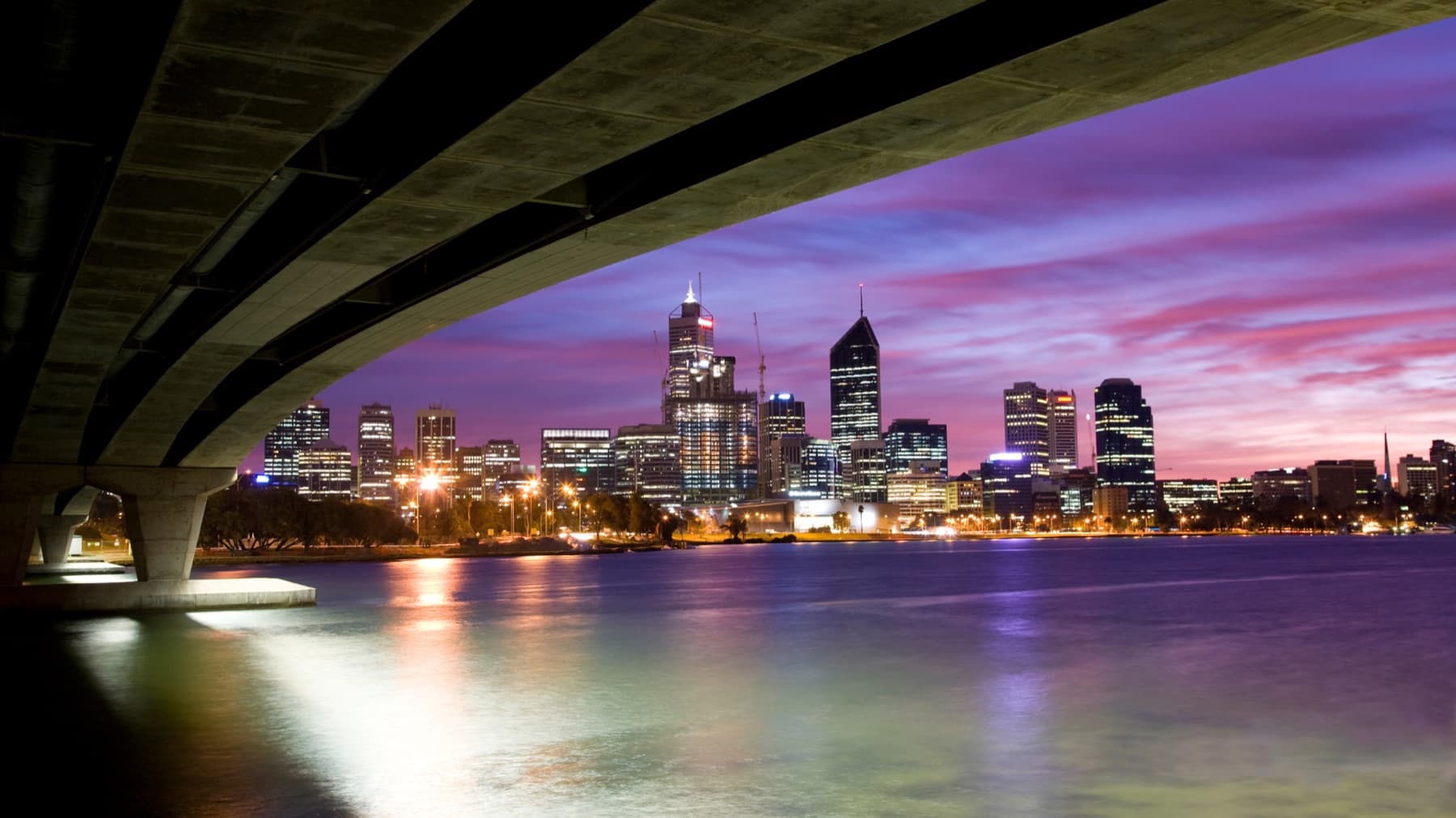 Perth city skyline at dusk from beneath the Narrows Bridge, Western Australia