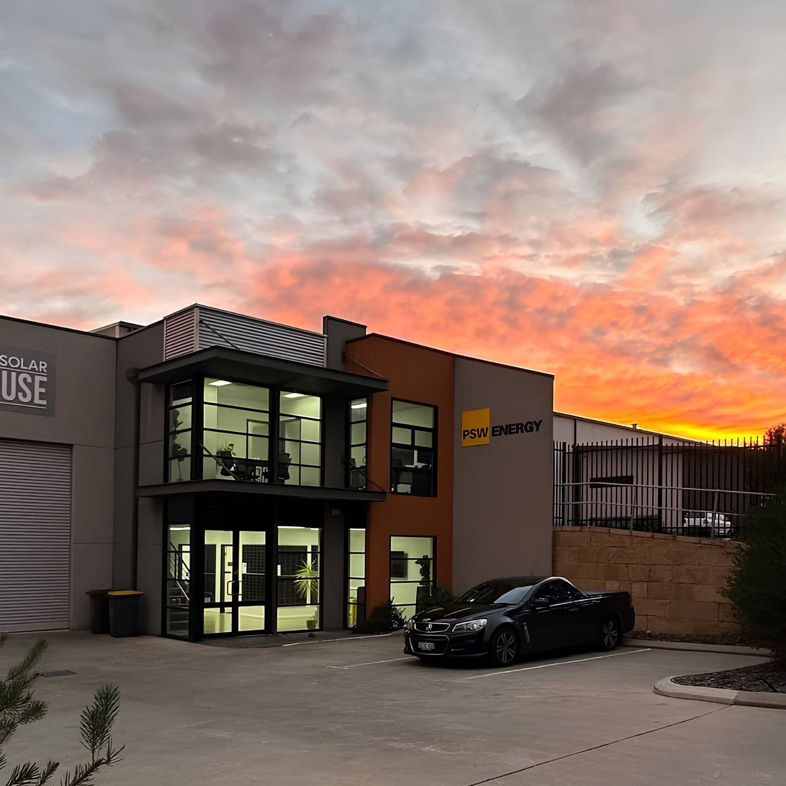 The Bibra Lake premises at sunrise, with the PSW Energy signage on the office frontage.
